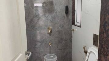 Shower, towels, soap, shampoo
