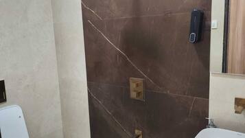 Shower, towels, soap, shampoo