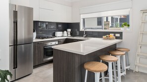 Microwave, coffee/tea maker, toaster, dining tables - Martha Cove Retreat with Pool Access (Safety Beach)