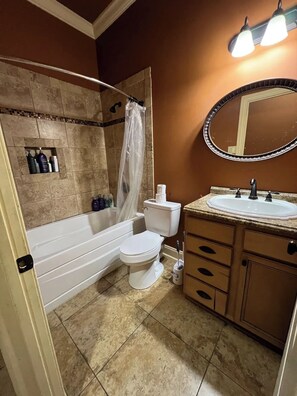 Hair dryer, towels, soap, toilet paper