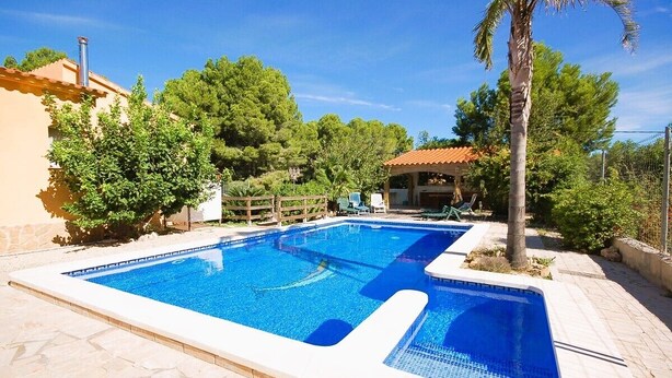 A rectangular swimming pool with clear blue water, surrounded by a tiled deck. - SAONA VILLAS (VN LAURE): villa 8 people, private pool, wifi, beach 3.5 km (Les Tres Cales)