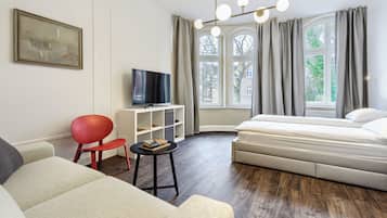 Apartamento | Sala de estar | Una televisión de pantalla plana