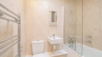 Shower, hair dryer, towels, shampoo