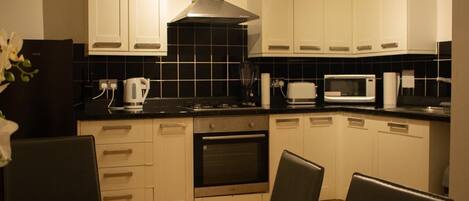 Apartment | Private kitchen | Fridge, microwave, oven, stovetop