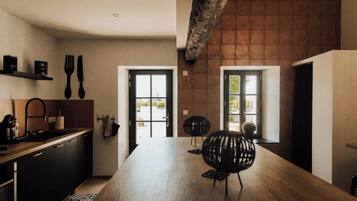 Apartamento conforto, vista para o vinhedo | Cozinha compartilhada | Cadeirão de bebê