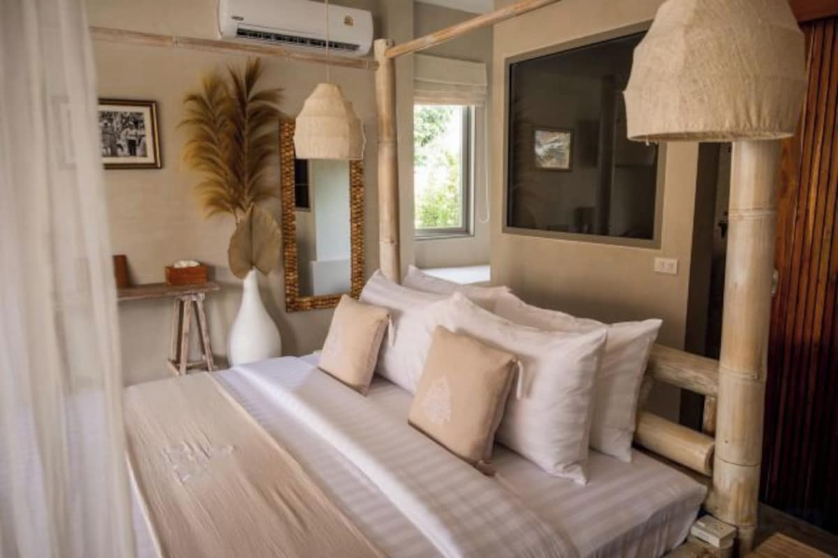 Camas con pillow-top y caja de seguridad en la habitación