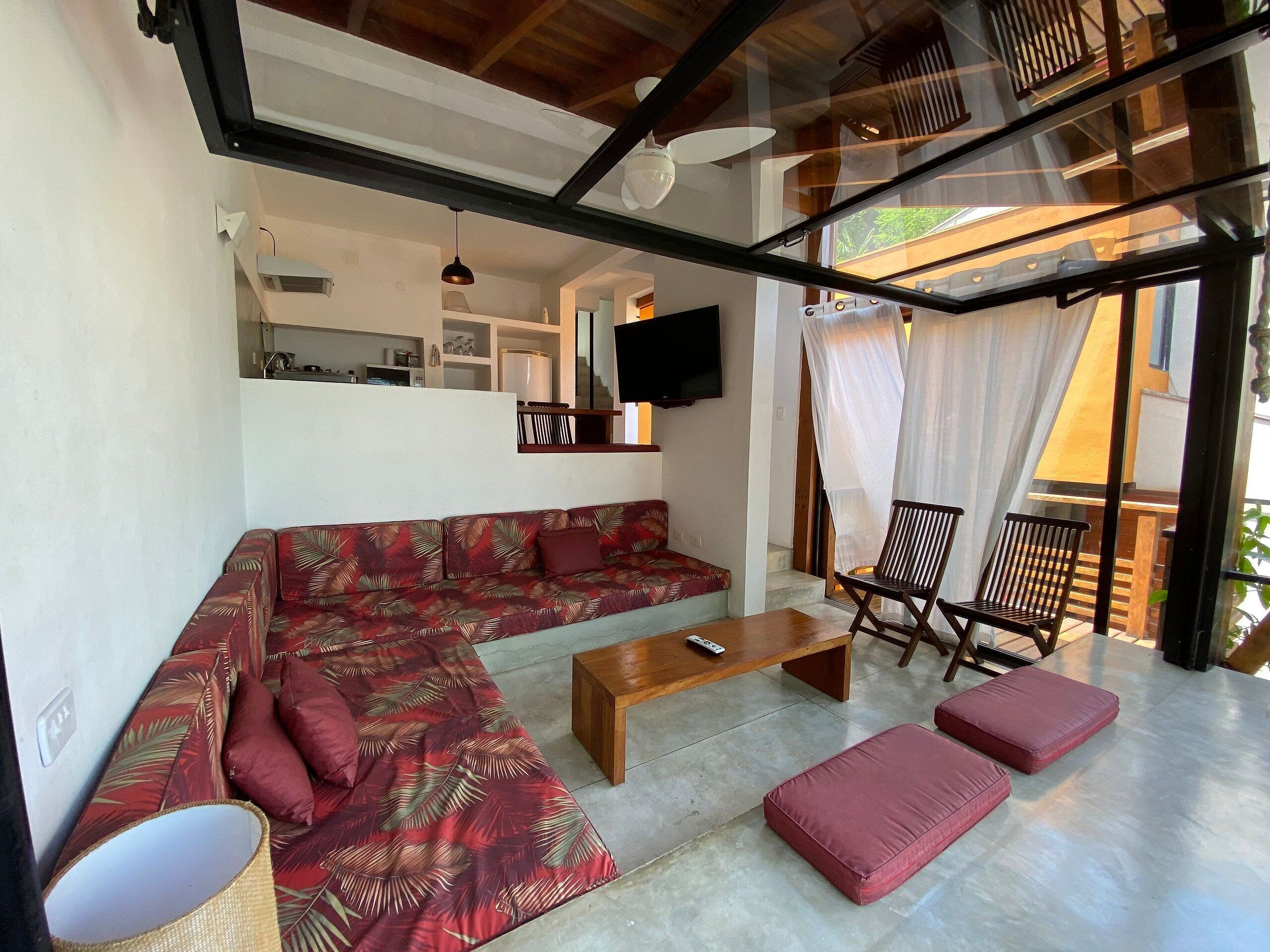 Basic Villa | Living area | 50-inch Smart TV with satellite channels