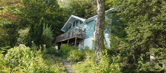 Sunny south-facing lakefront cottage with sauna close to ski hills and trails