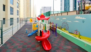 Children's area - Chic Studio in The Crescent A, Dubai Production City by Deluxe Holiday Homes (Dubai)