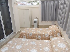 3 bedrooms, in-room safe, iron/ironing board, travel crib