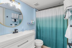 Hair dryer, towels, soap, shampoo
