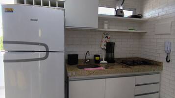 Full-sized fridge, toaster, blender, cookware/dishes/utensils