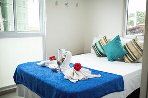 Blackout curtains, iron/ironing board, free WiFi, bed sheets