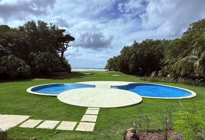 Amazing 3 bedroom Rio Dulce Condo w/beachfront views and pool in Hacienda Iguana