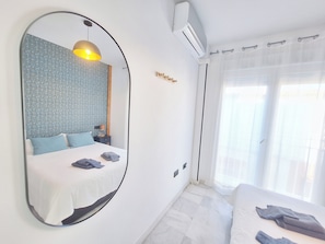 1 dormitorio, tabla de planchar con plancha, Internet y ropa de cama