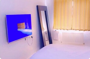 2 quartos, ferros/tábuas de passar roupa, Wi-Fi, roupa de cama