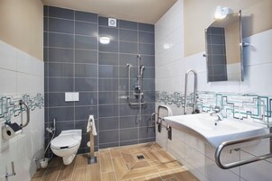 Shower, hair dryer, bathrobes, towels