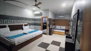 Family Quadruple Room, Garden View | In-room safe, desk, laptop workspace, iron/ironing board - manya home stay (Agra)