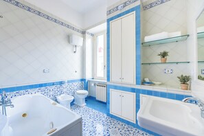 Shower, jetted tub, hair dryer, bidet