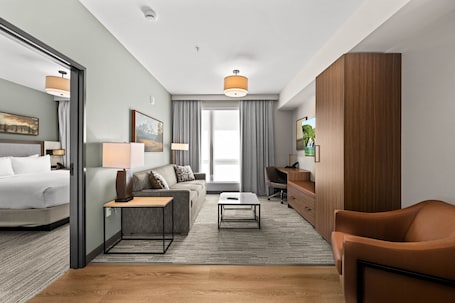 Deluxe Suite, 1 King Bed with Sofa bed, Kitchenette | 1 bedroom, in-room safe, free WiFi, bed sheets