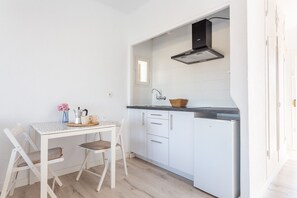 Fridge, coffee/tea maker, toaster, cookware/dishes/utensils