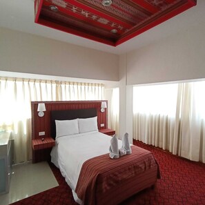 Premium bedding, down duvets, in-room safe, laptop workspace