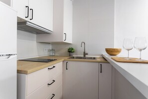 Fridge, microwave, coffee/tea maker, electric kettle