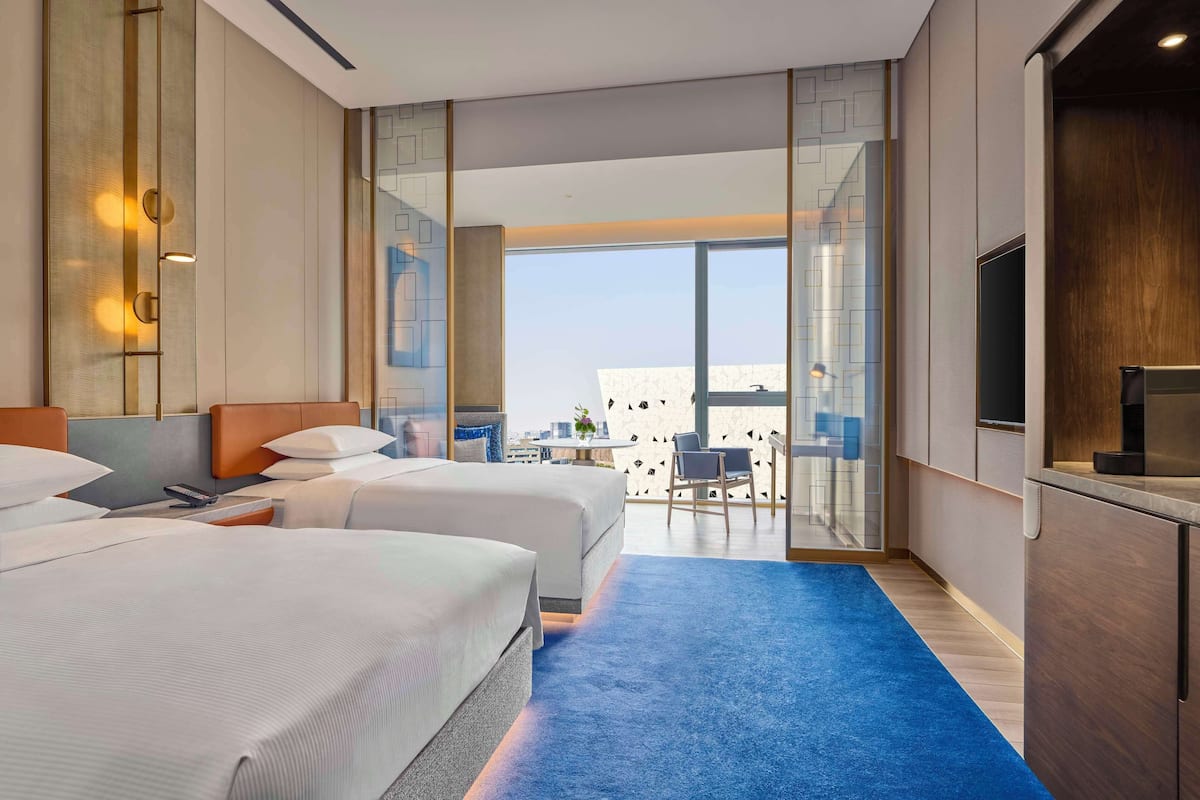 Premium bedding, down duvets, pillow-top beds, in-room safe