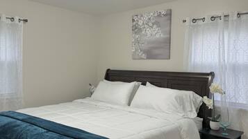 2 habitaciones, tabla de planchar con plancha y cuna de viaje