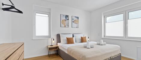 2 slaapkamers, een strijkplank/strijkijzer, gratis wifi, beddengoed