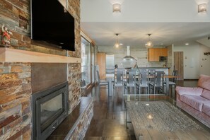 TV, fireplace - Country House 'La Puerta Del Río Lobos I' with Private Pool, Shared Terrace and Wi-Fi (San Leonardo de Yagüe)