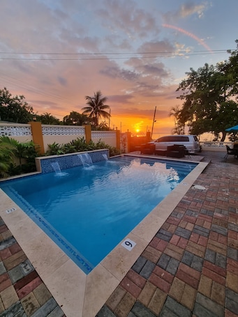 Outdoor pool. Charming Seaview Studio with Private Pool & Complimentary Airport Transfer!