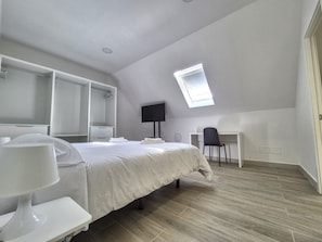 3 bedrooms, desk, iron/ironing board, travel cot