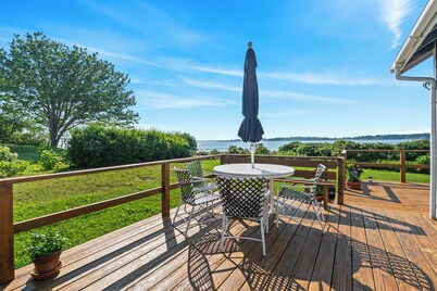 The Beach Pea 2 BR/1 BA Beachside bungalow feet from the Maine shore.