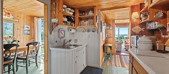 New! The Beach Pea 2 BR/1 BA Beachside bungalow feet from the Maine shore.