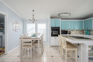 Fridge, microwave, stovetop, dishwasher - Pet-Friendly, Stylish 3-Bedroom Home with Outdoor Oasis (Tybee Island)