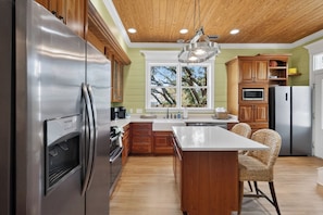 Fridge, microwave, stovetop, dishwasher - 7BR Family Retreat | Multiple Porches + Private Spaces For Everyone (Tybee Island)