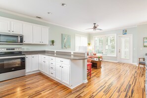 Fridge, microwave, stovetop, dishwasher - Marsh Haven | 3BR Coastal Getaway with Screened Porch & Peaceful Views (Tybee Island)