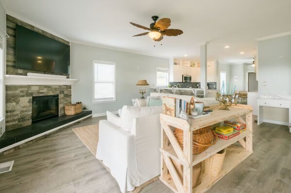 Télévision, cheminée, baby-foot, table de tennis de table