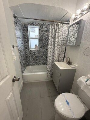 Hair dryer, towels, soap, shampoo