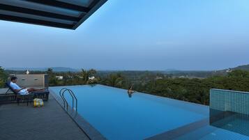 Outdoor pool, open 9:30 AM to 6:30 PM, free cabanas, sun loungers