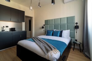 Condo Confort, 1 grand lit, non-fumeur, cuisine | Rideaux d’obscurcissement, fer et planche à repasser
