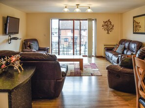 Living area - Attractive "upside down" waterside home, with four en-suite bedrooms. (Horning)