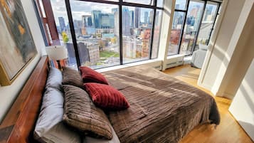 1 bedroom, desk, iron/ironing board, travel crib