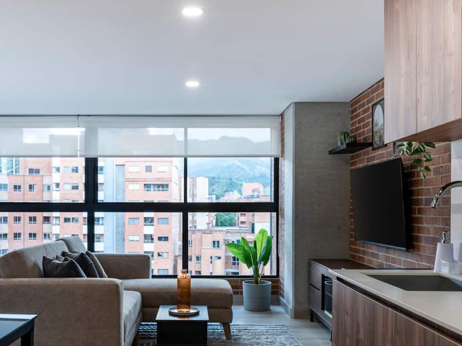 Deluxe Studio | Living area | 55-inch Smart TV with cable channels, streaming services