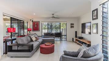 Apartment, 3 Bedrooms | Living area | 55-inch Smart TV with digital channels, Netflix, streaming services