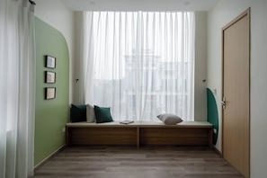 Family Suite, City View | Premium bedding, down duvets, Tempur-Pedic beds, free minibar items - JOY.ur Home (Ninh Bình)