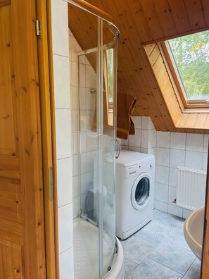 Shower, hair dryer, towels
