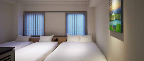 Habitación triple básica | Wifi gratis y ropa de cama