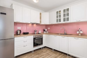 Villa (Three Bedroom) | Private kitchen | Fridge